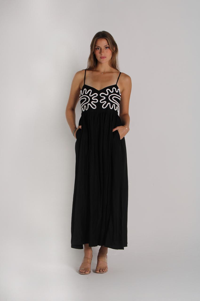 Long black dress with beige embroidery
