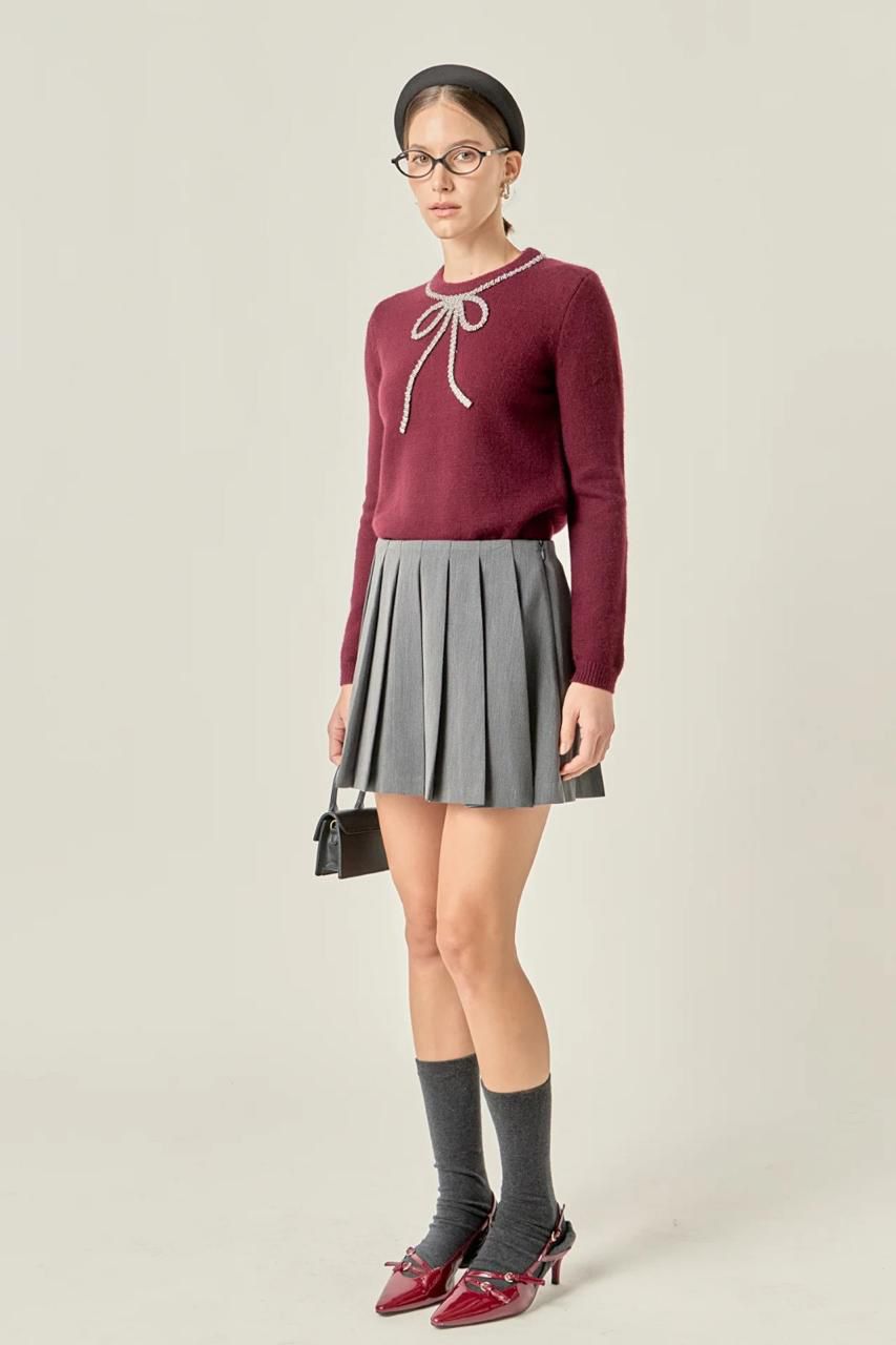 SWEATER WITH BOW AND GLITTER