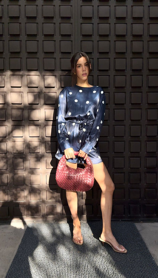 Blue romper with white polka dots