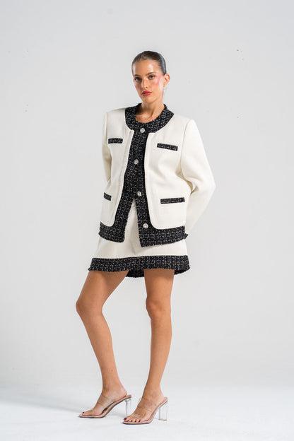 Conjunto de suéter elegante y falda corta