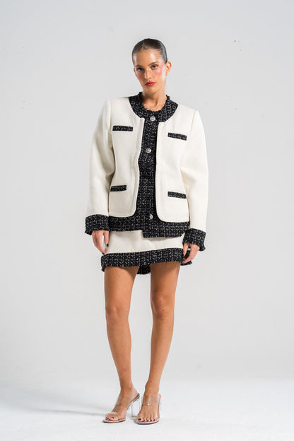 Conjunto de suéter elegante y falda corta