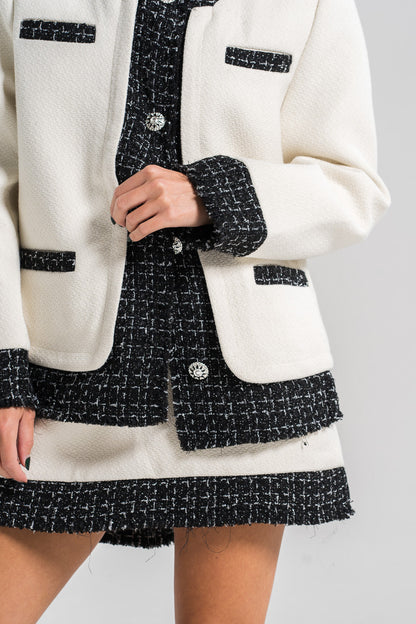 Conjunto de suéter elegante y falda corta